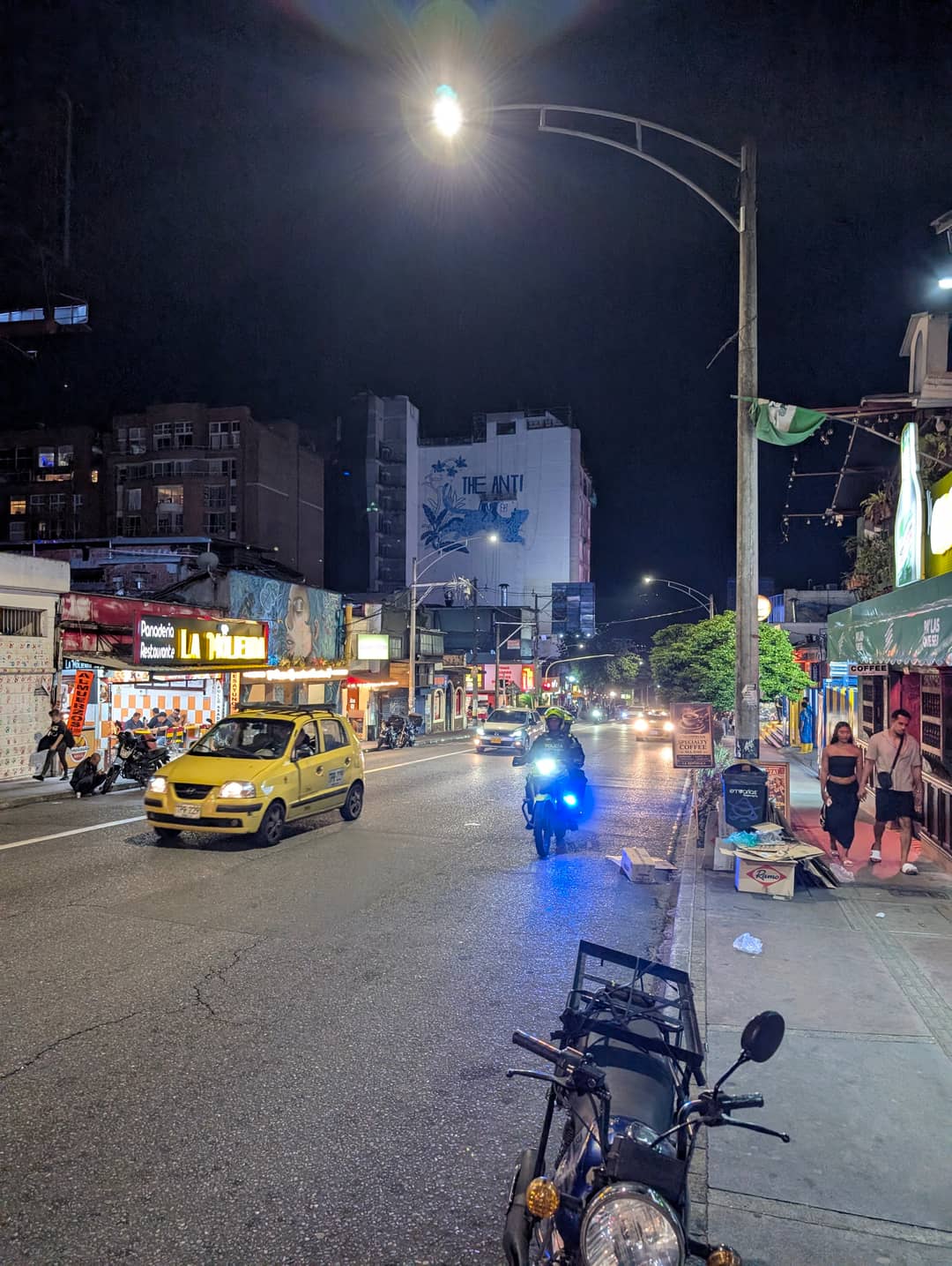 Taxis and motorbikes. Eight in the evening.