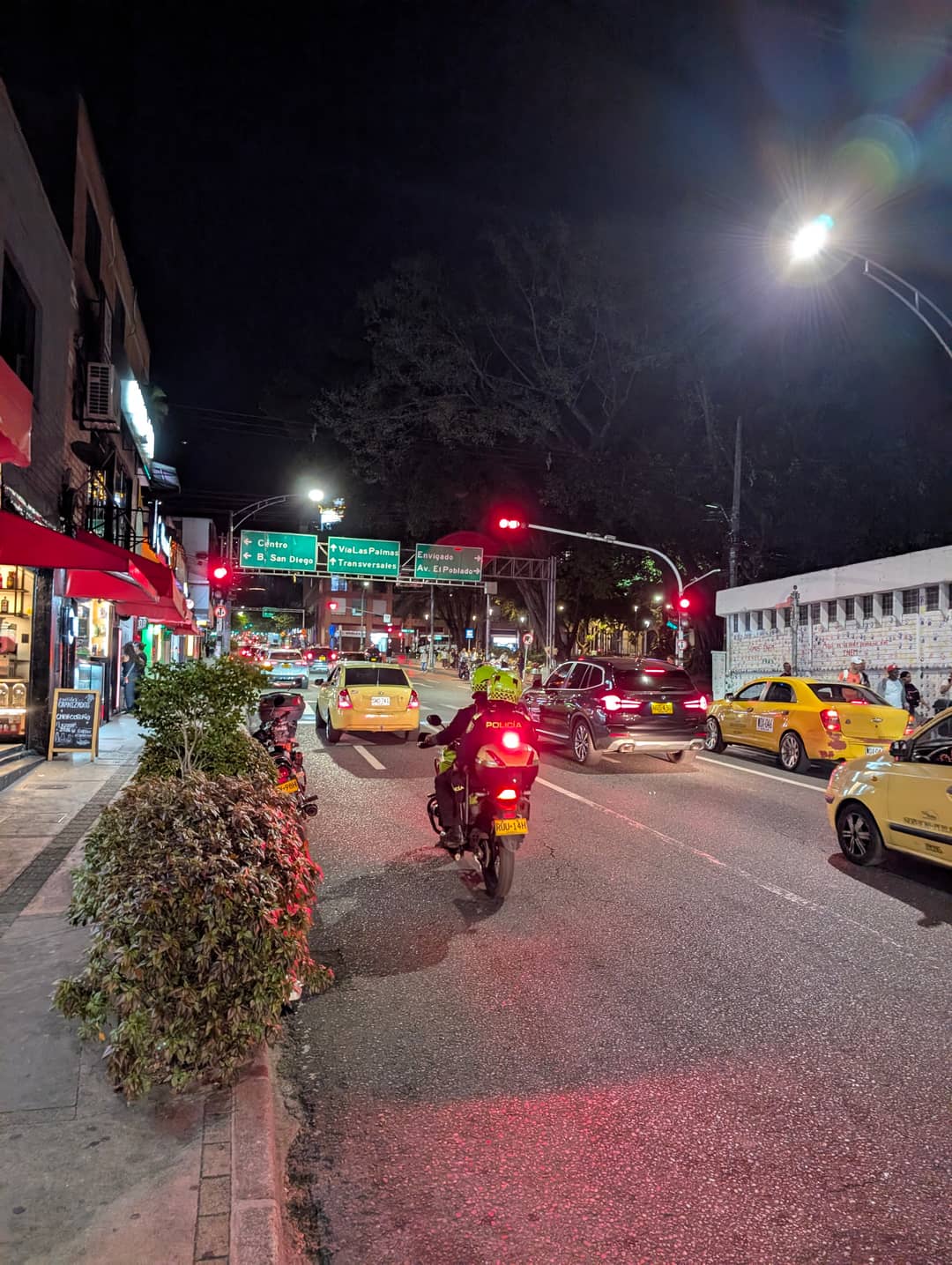 The street has switched its lights on.