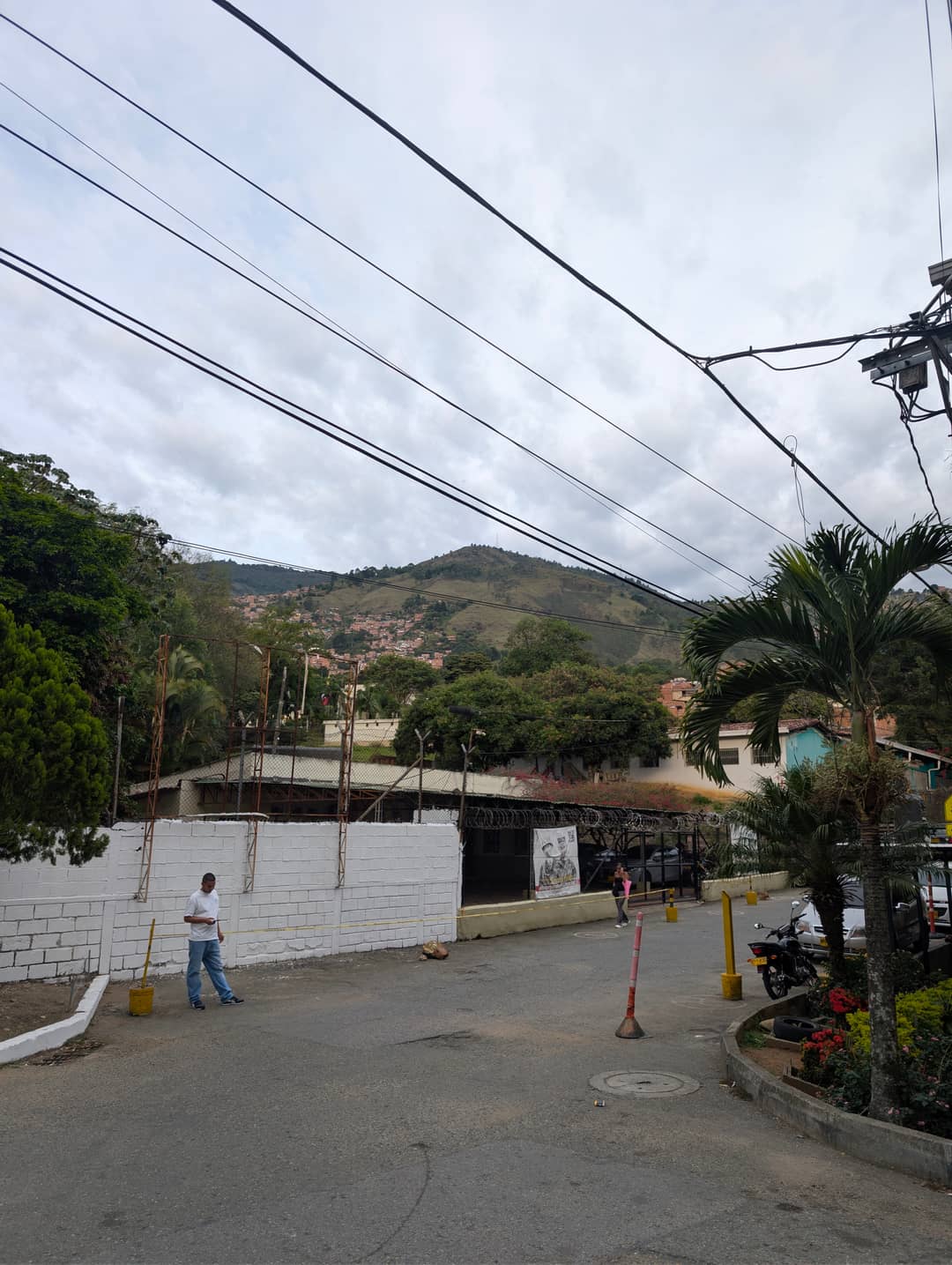 Houses climb the slope as far as they can.