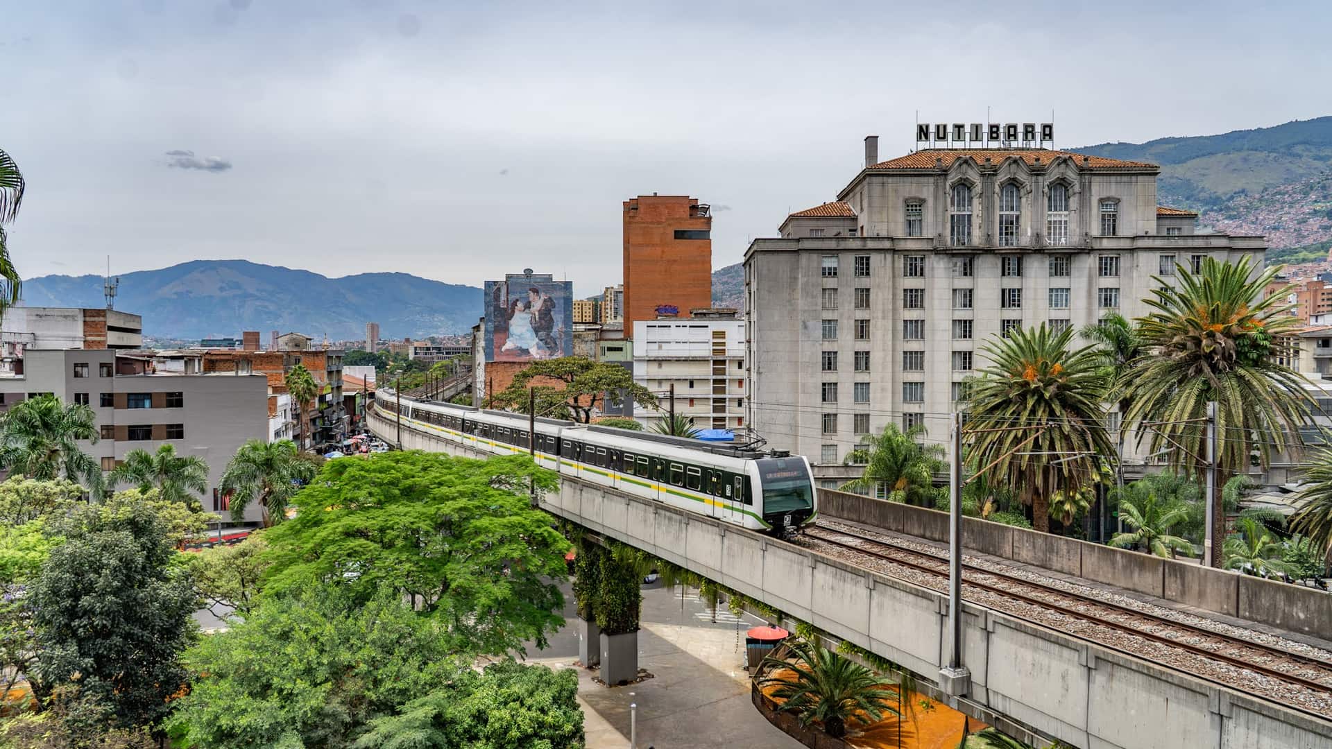 The metro viaduct over the centre. The train runs at second floor height, so you can look the district over before you set foot in it.